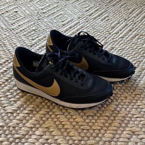 Nike Daybreak Black Sneakers with Gold Swoosh Accent